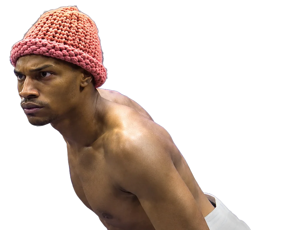 Nigga in the boxing ring, hat on, staring down the camera